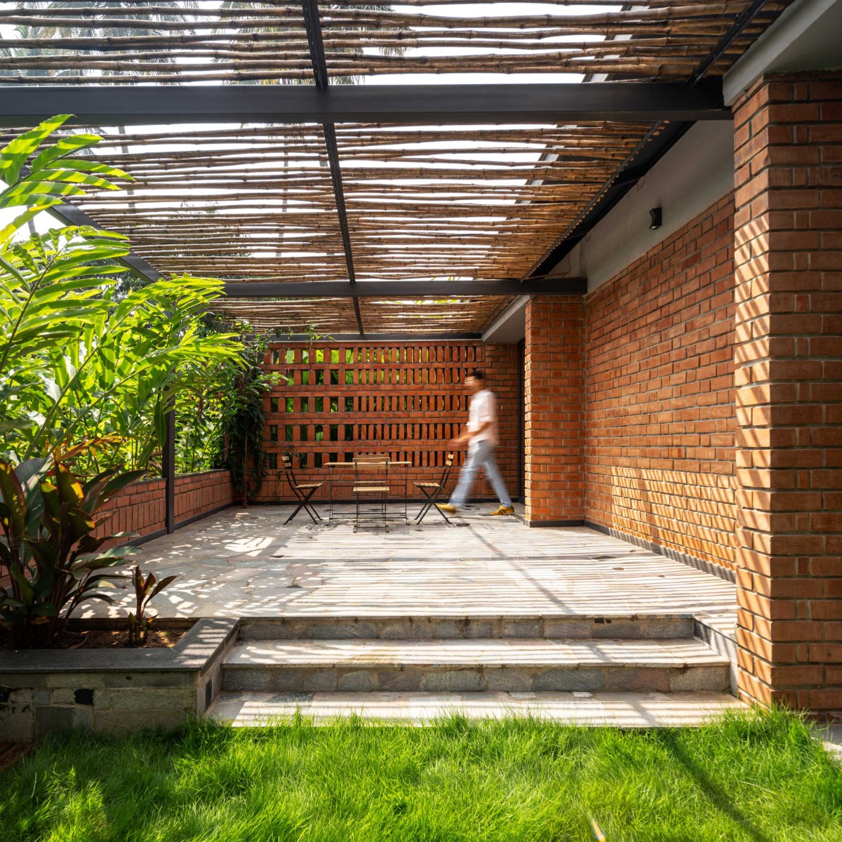 Open Court of Between the Mango Trees by Enviarch Studio