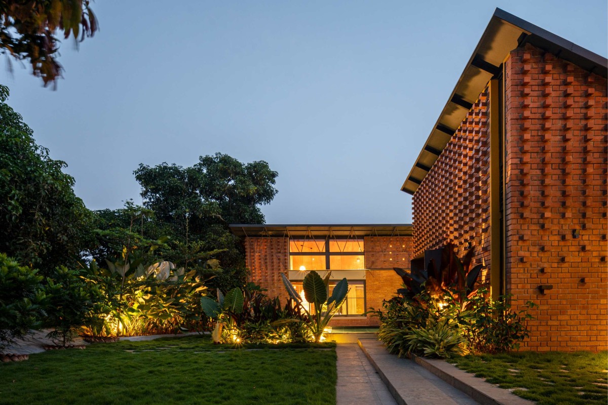 Dusk light exterior view of Between the Mango Trees by Enviarch Studio