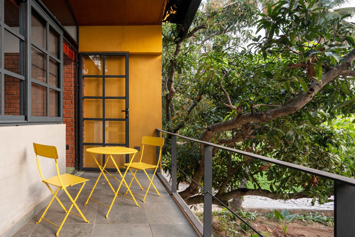 Balcony of Between the Mango Trees by Enviarch Studio