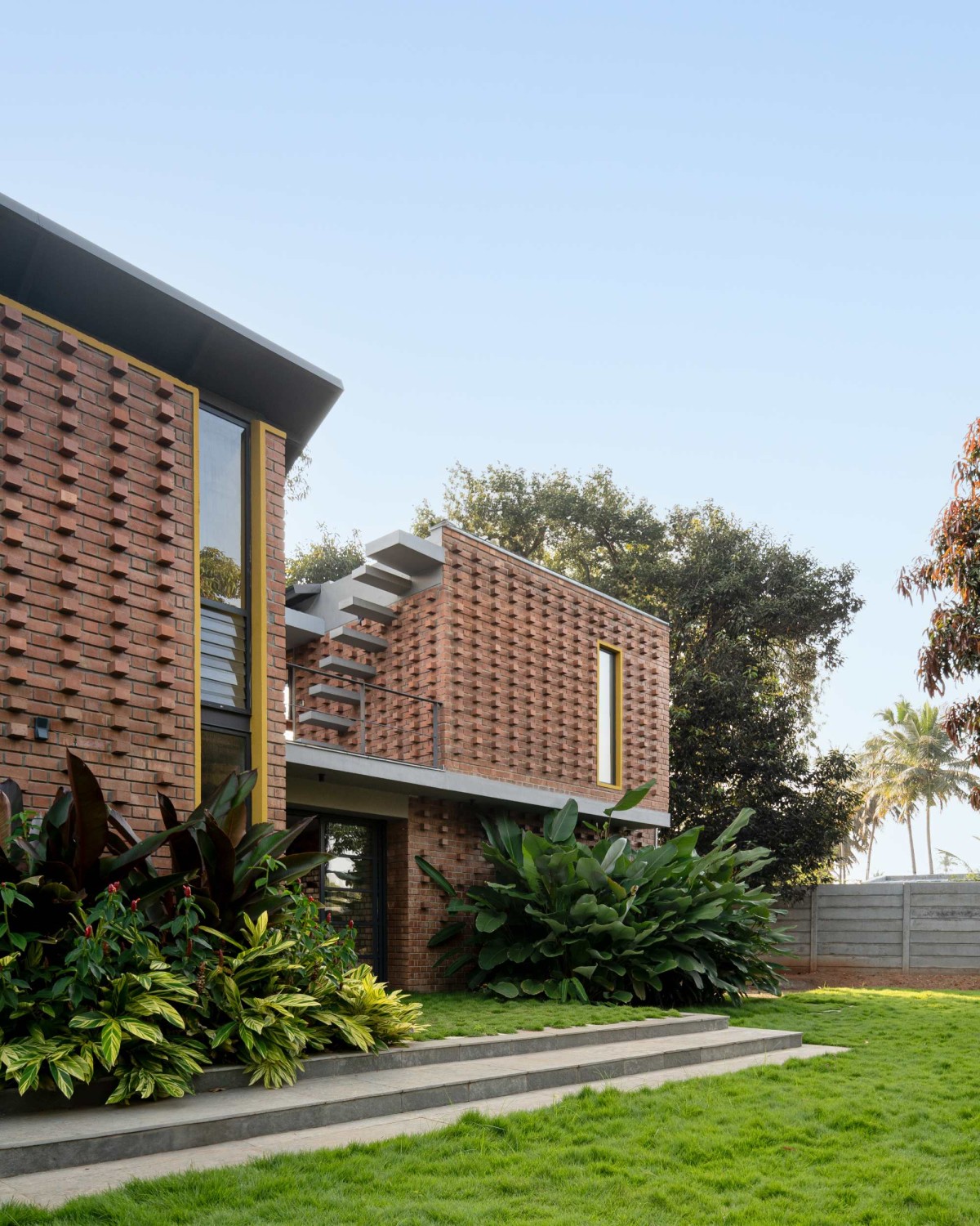 Exterior view of Between the Mango Trees by Enviarch Studio