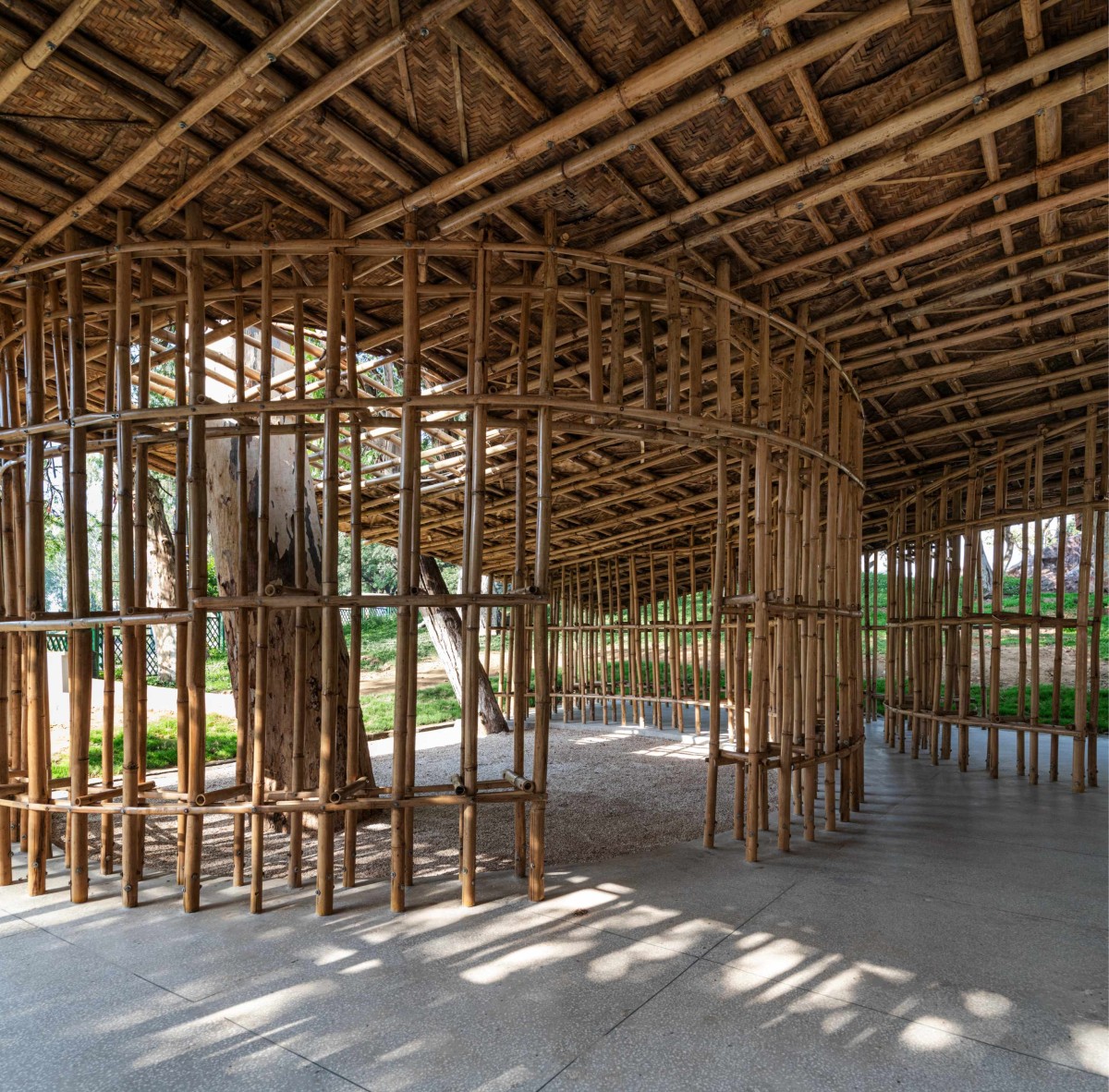 Tripura Court highlighting the low ceiling of North-East Bamboo Pavilion by  atArchitecture