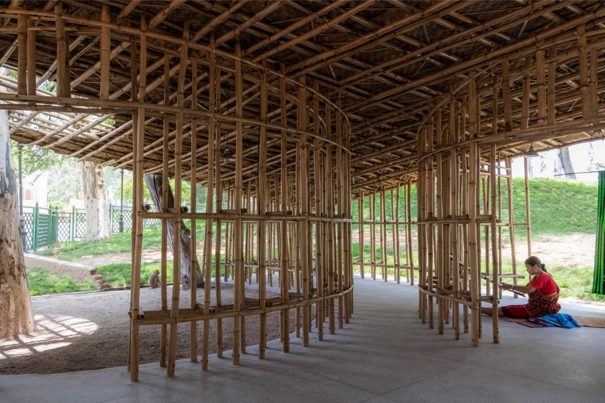 Artist demonstrate Tripura Loom of North-East Bamboo Pavilion by  atArchitecture