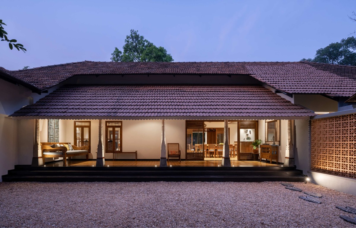 Dusk light exterior view of Muttom Residence by EDOM Architecture