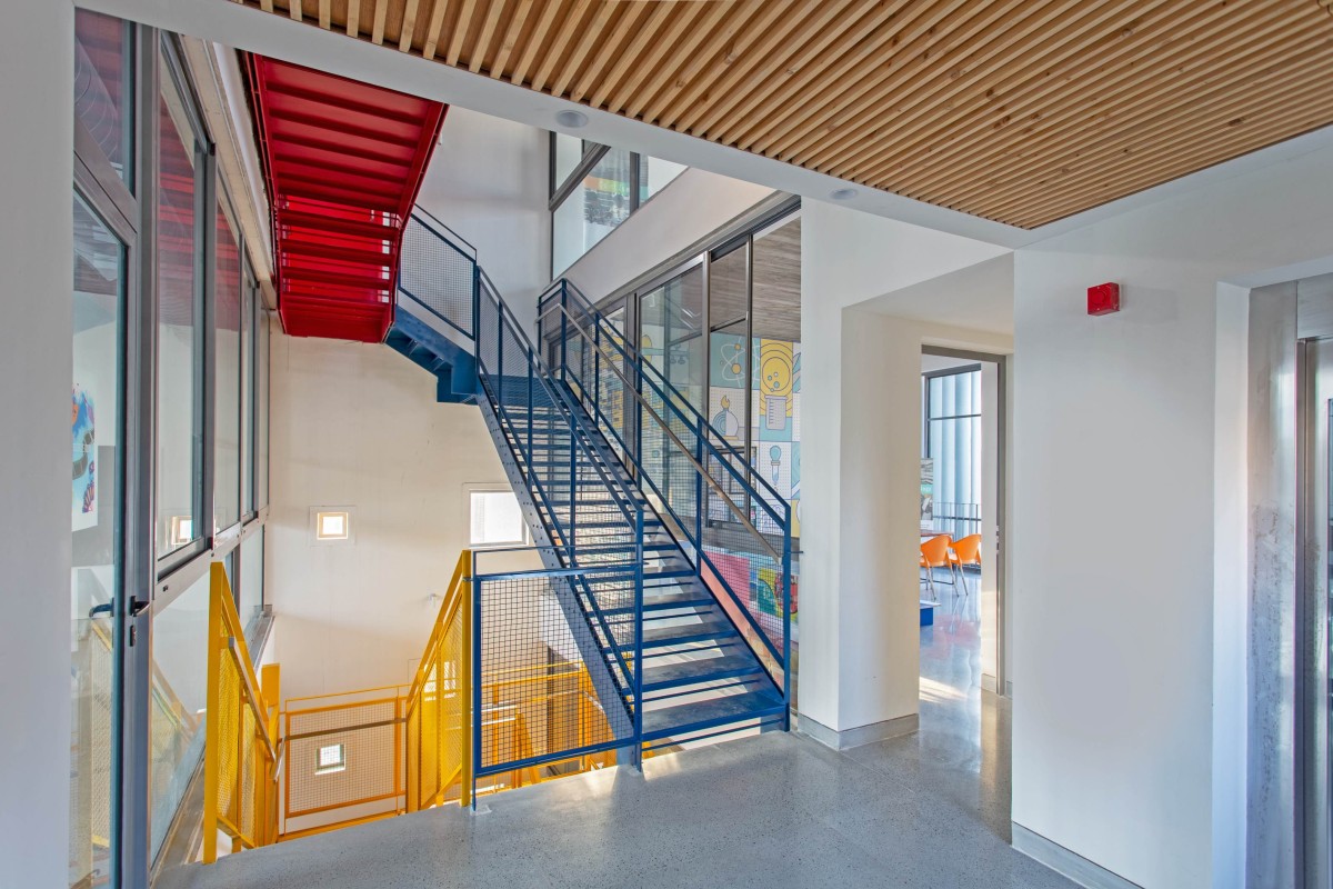 Metal Staircase of Learning Center at Quest by KSM Architecture