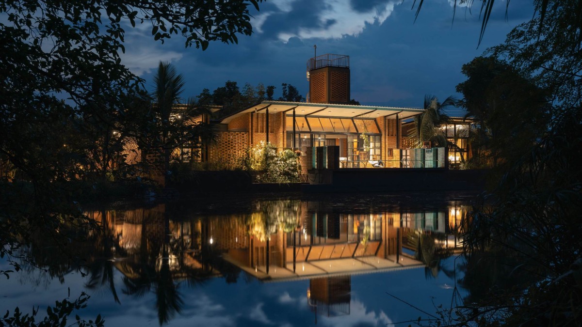 Night view of Habitat by The Lake by Studio Prakriya