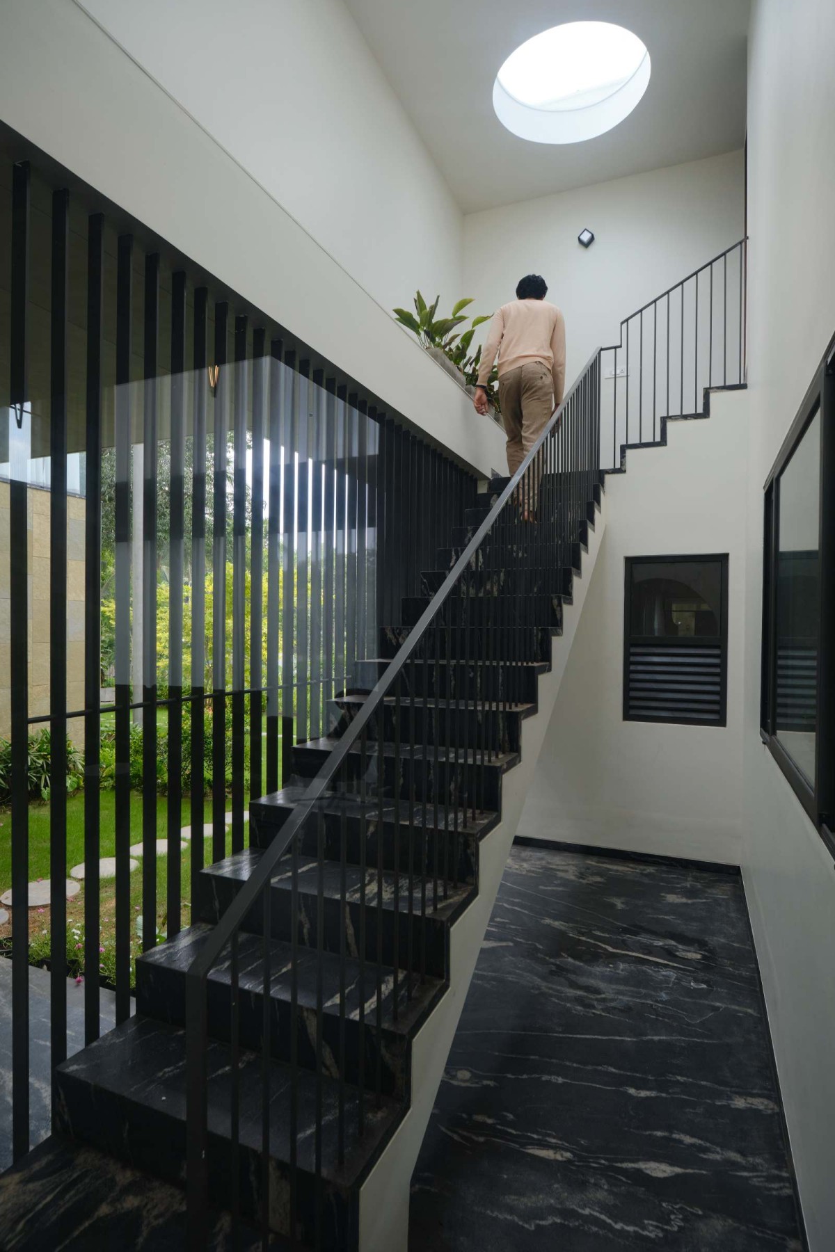 Staircase of Payyavoor House by SOHO Architects