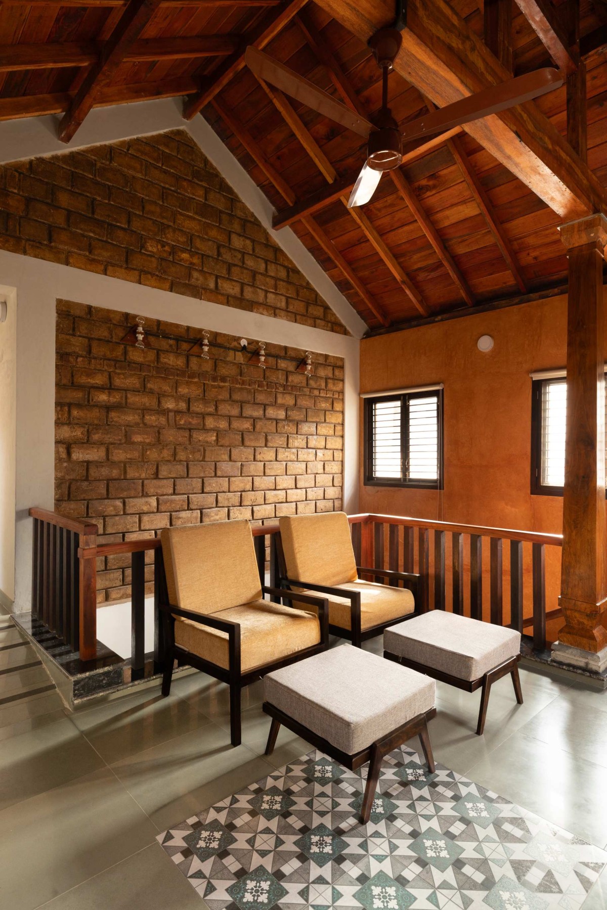 Upper living of Nithin Rao's Residence by Praangana Earthern Architecture