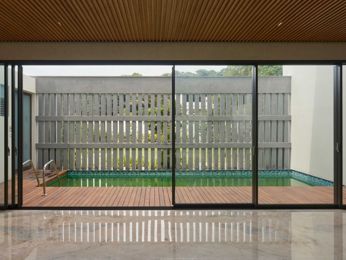 Passage to pool area of Mathamangalam House by SOHO Architects