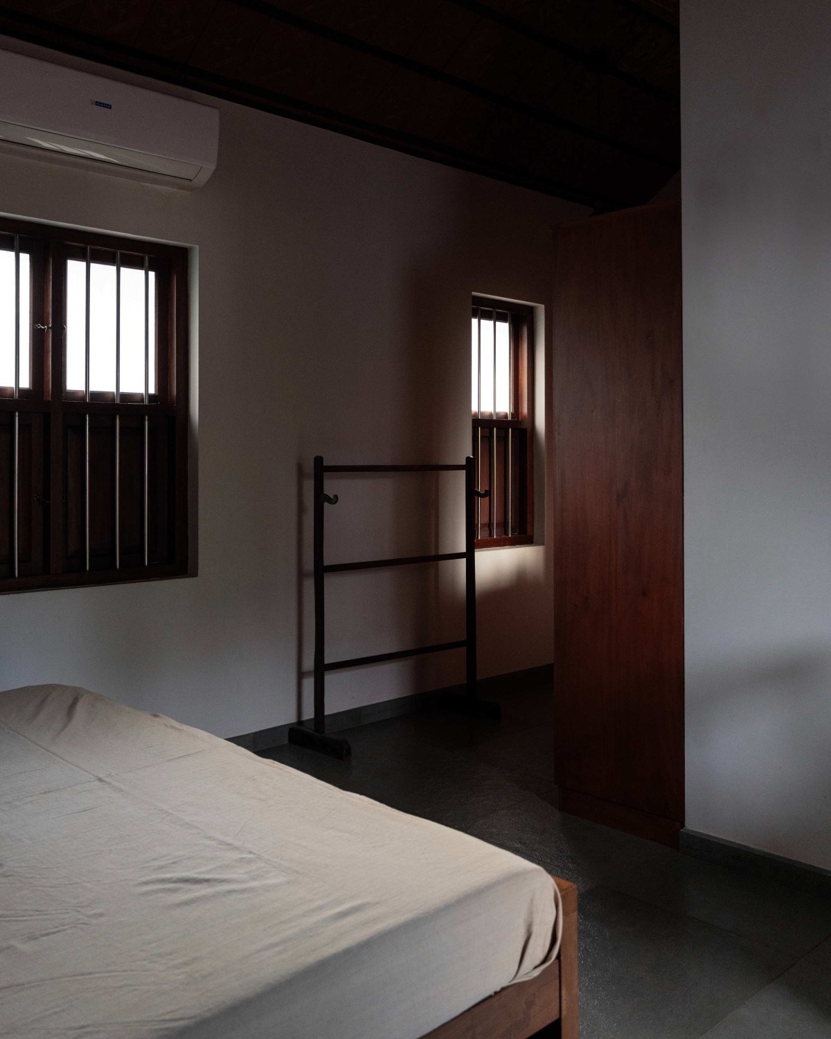 Bedroom of Kaloor Residence by VSP Architects