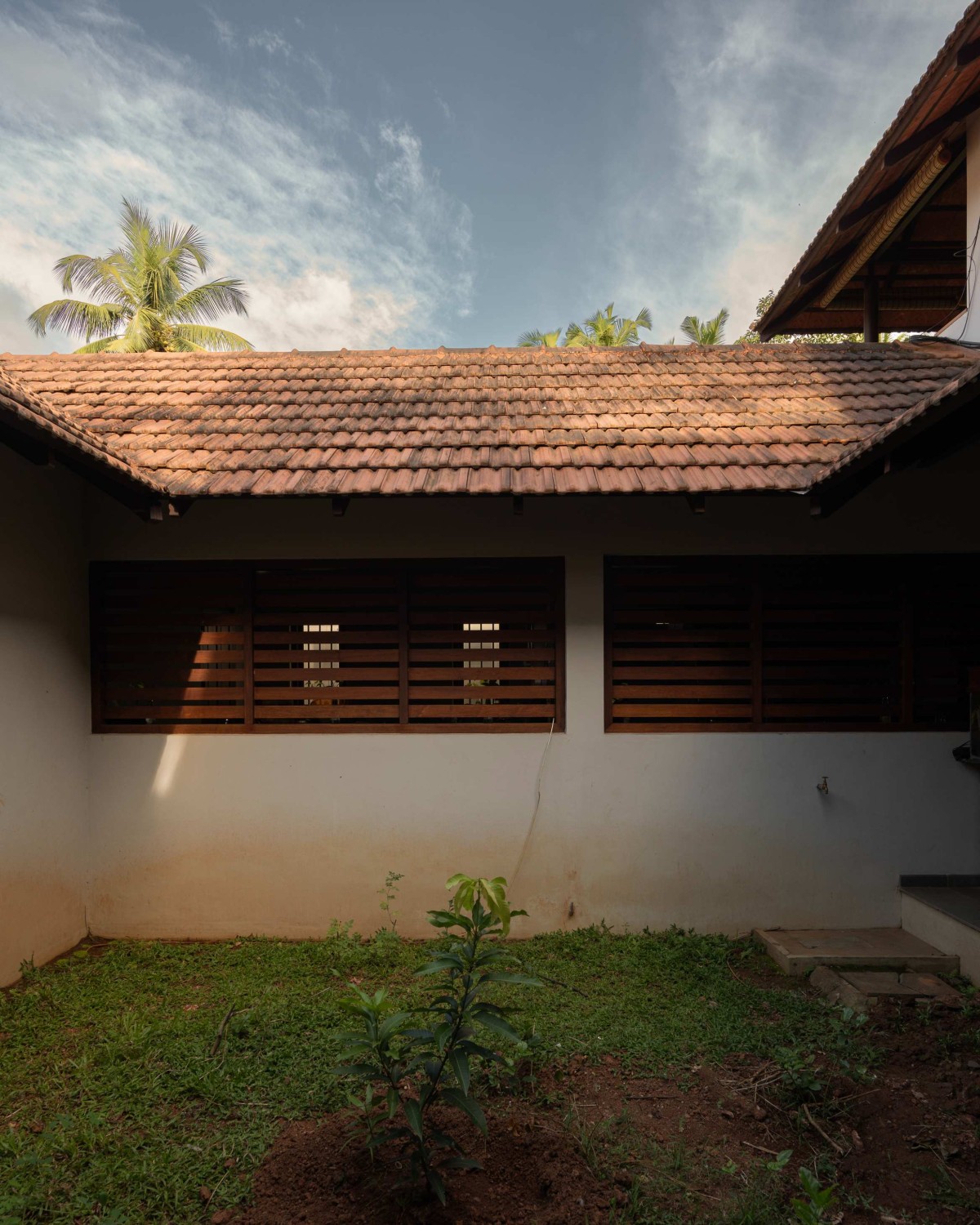 Courtyard of Kaloor Residence by VSP Architects