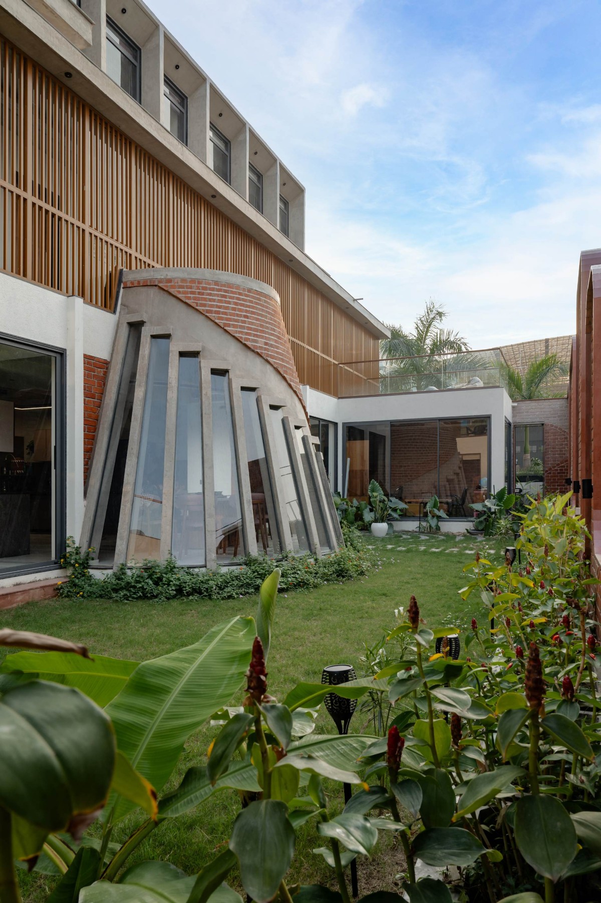 Garden view of Harshaangan - A House for Gardens by Aangan Collaborative LLP