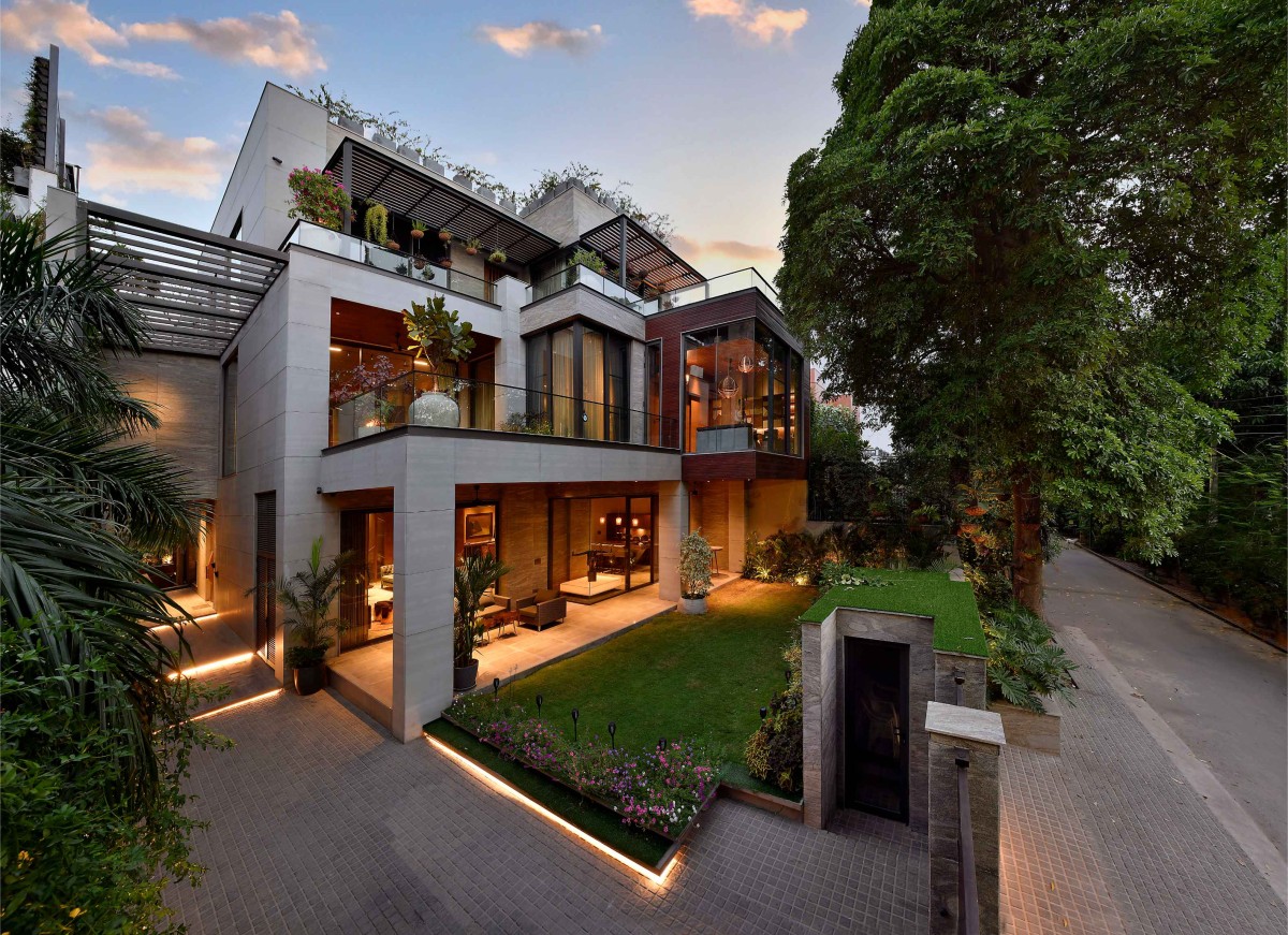 Dusk light exterior view of T House by Saka Studio