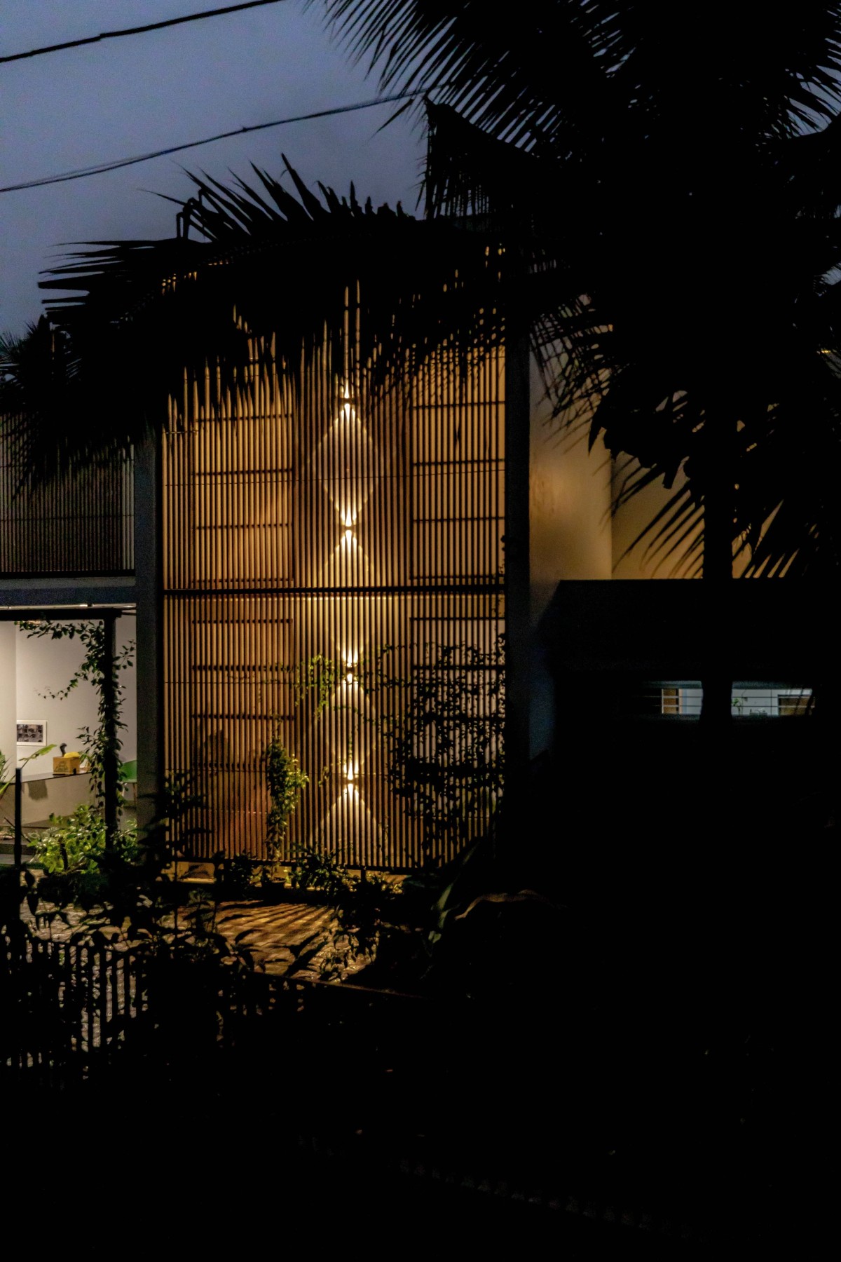 Night shot exterior view of Aman by Studio Hum