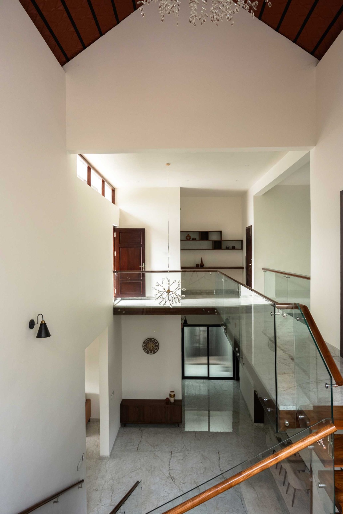 View from staircase of House Beneath a Jackfruit Tree by Uru Consulting LLP