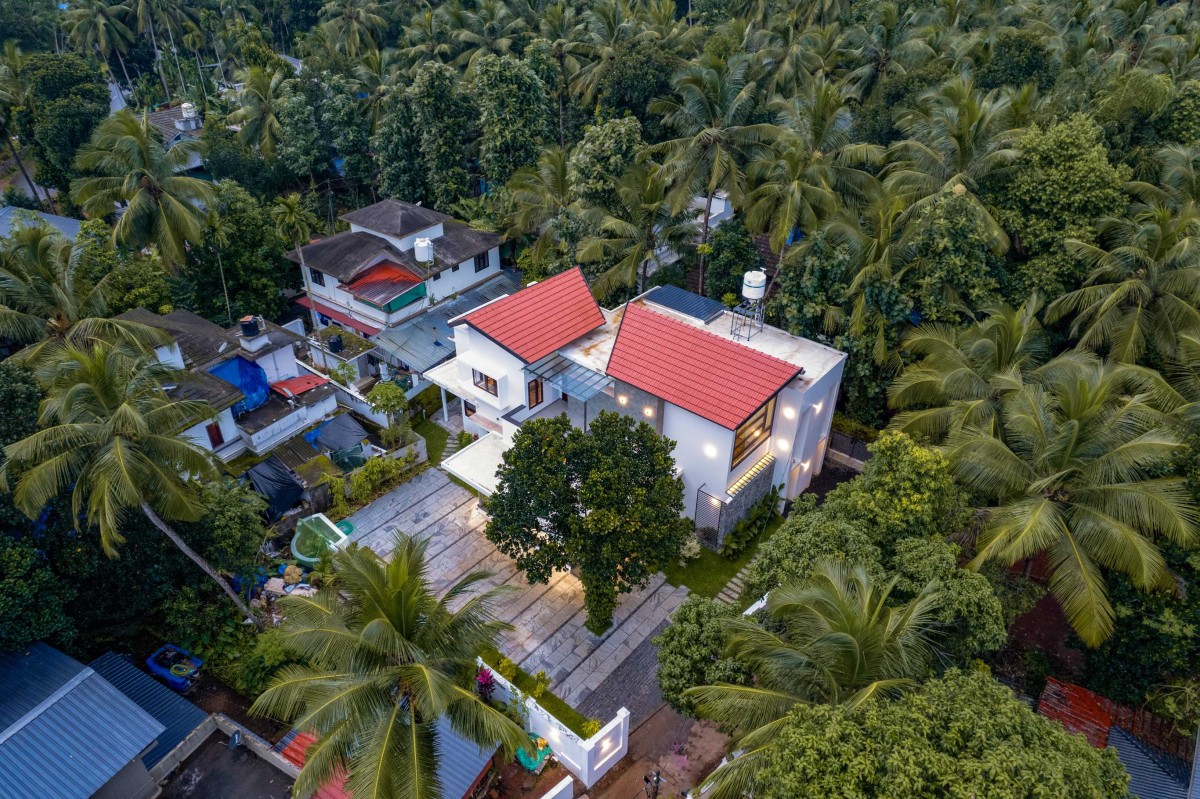 Aerial view of House Beneath a Jackfruit Tree by Uru Consulting LLP