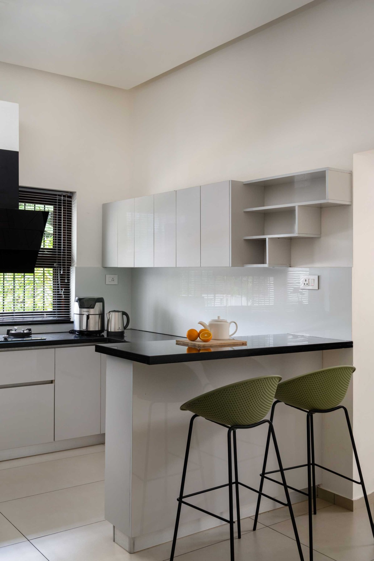 Kitchen of House Beneath a Jackfruit Tree by Uru Consulting LLP