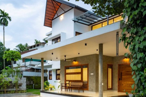 House Beneath a Jackfruit Tree by Uru Consulting LLP