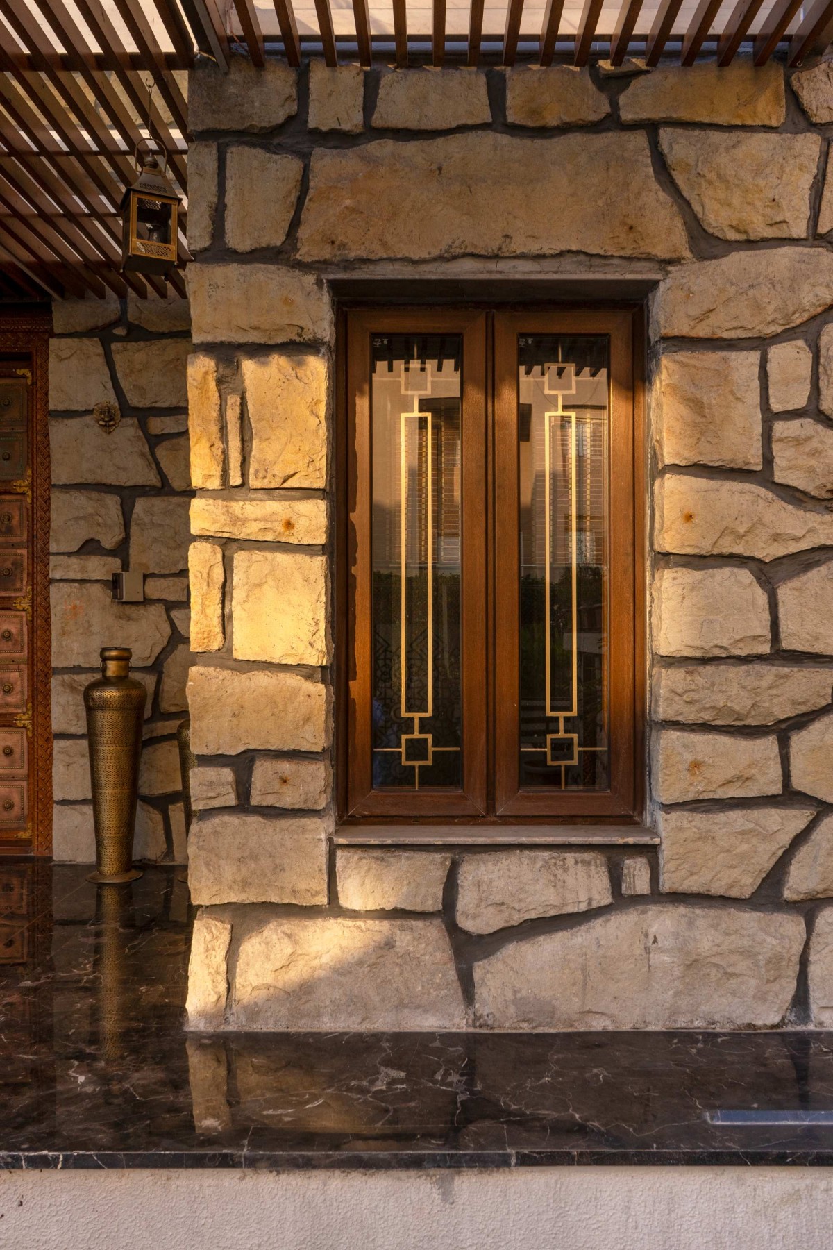 Detailed shot of wall & window of Framing the 'STONE' by Tushar Bhambare & Associates