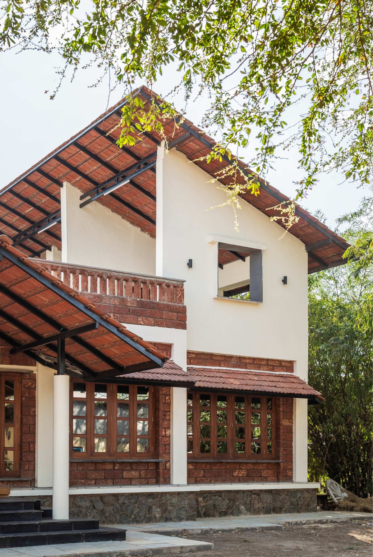 Exterior view of Suryangan - The Courtyard House by Suyash Mankame Design Studio