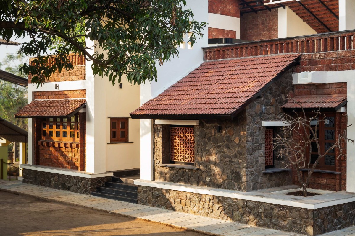 Exterior view of Suryangan - The Courtyard House by Suyash Mankame Design Studio