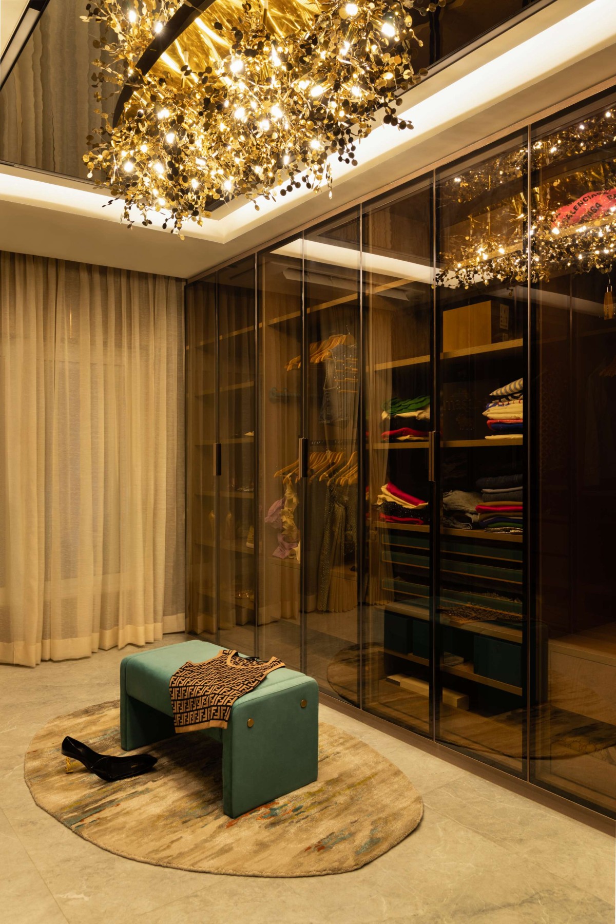 Walk in wardrobe of Luxe Layers by MN Architecture & Interiors