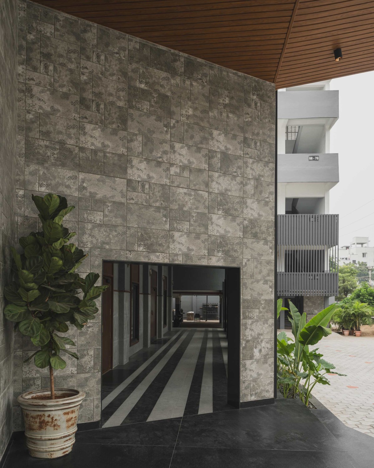 Entry passage of JKC Auditorium by Dimensions
