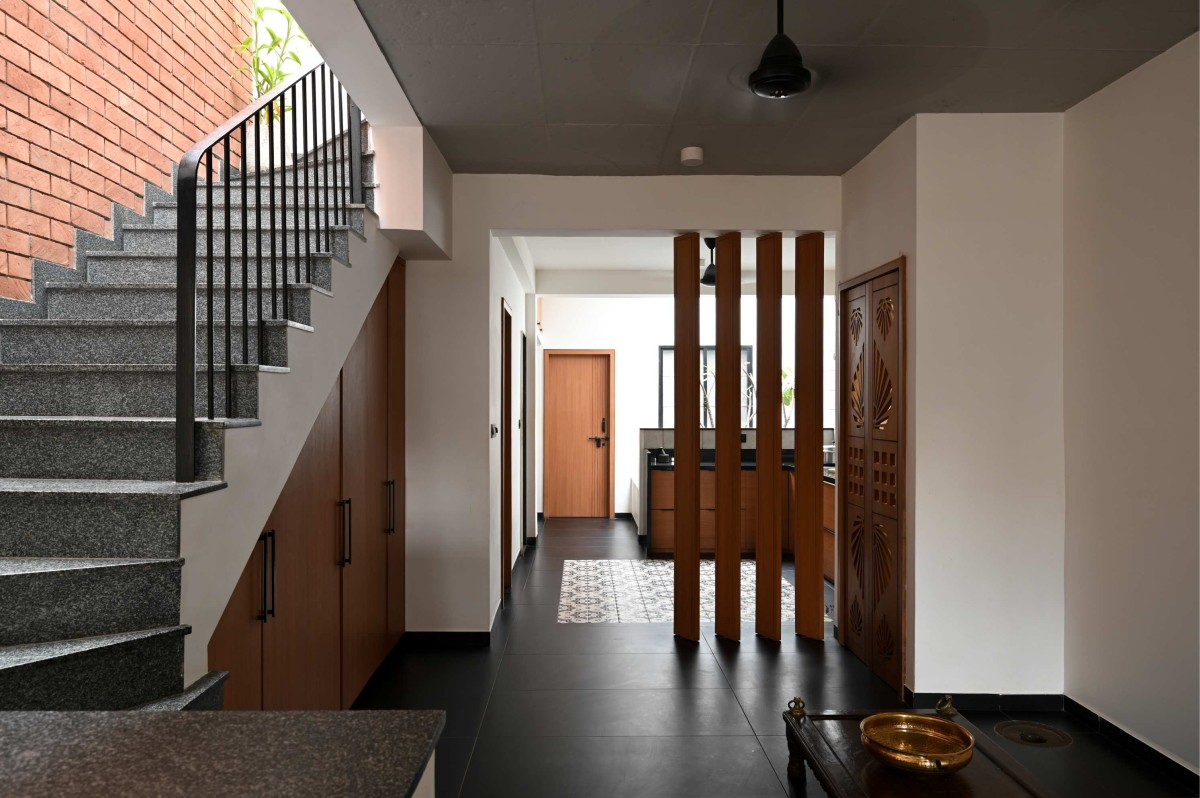 Dining to Kitchen view of 13X70 House by Studio ZERO.1