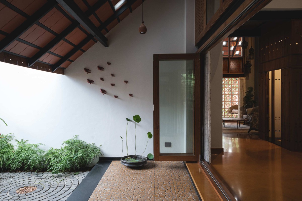 Passage to courtyard of Swasti by Deearth Architects