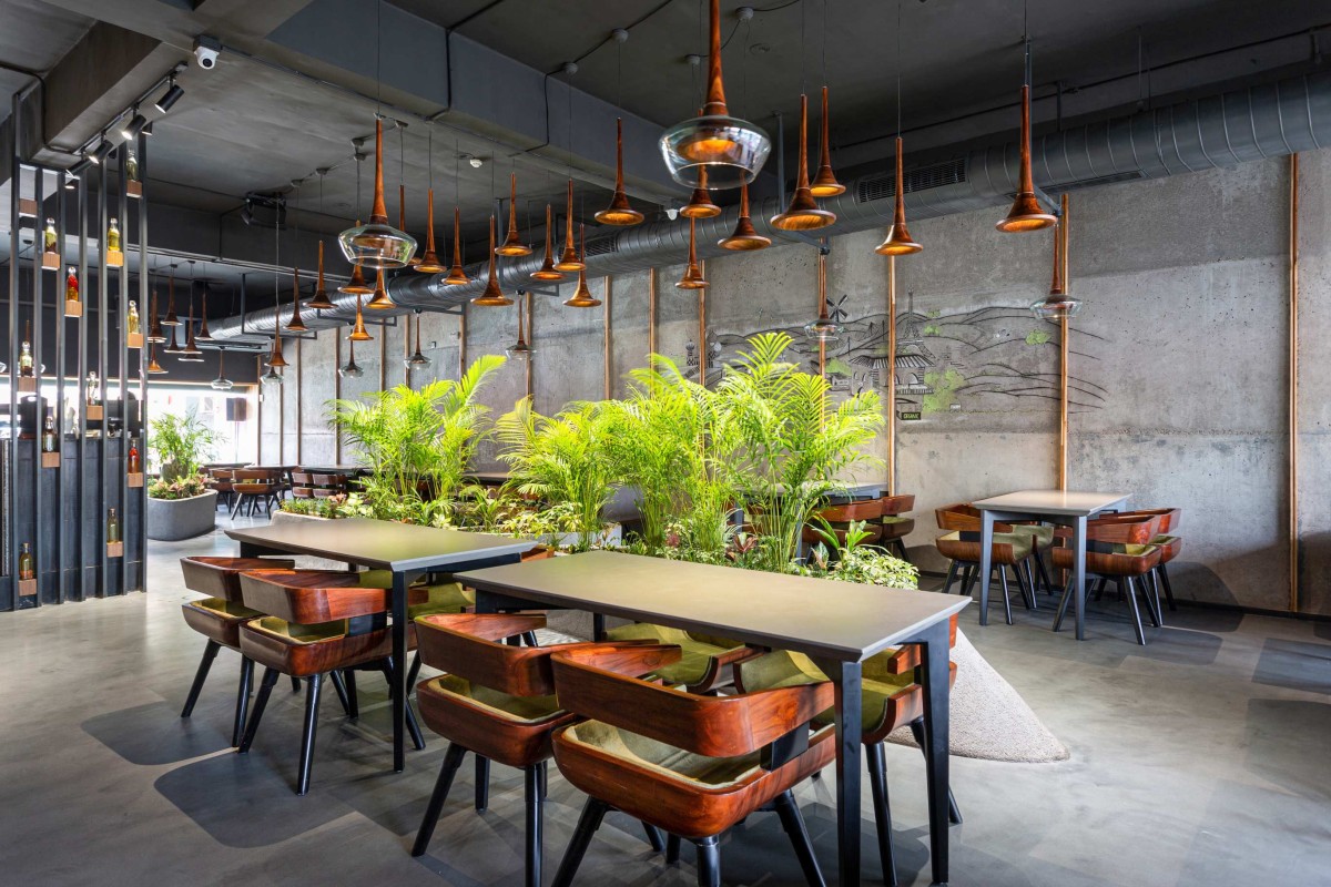 Indoor dininig of Aja by Arch.Lab