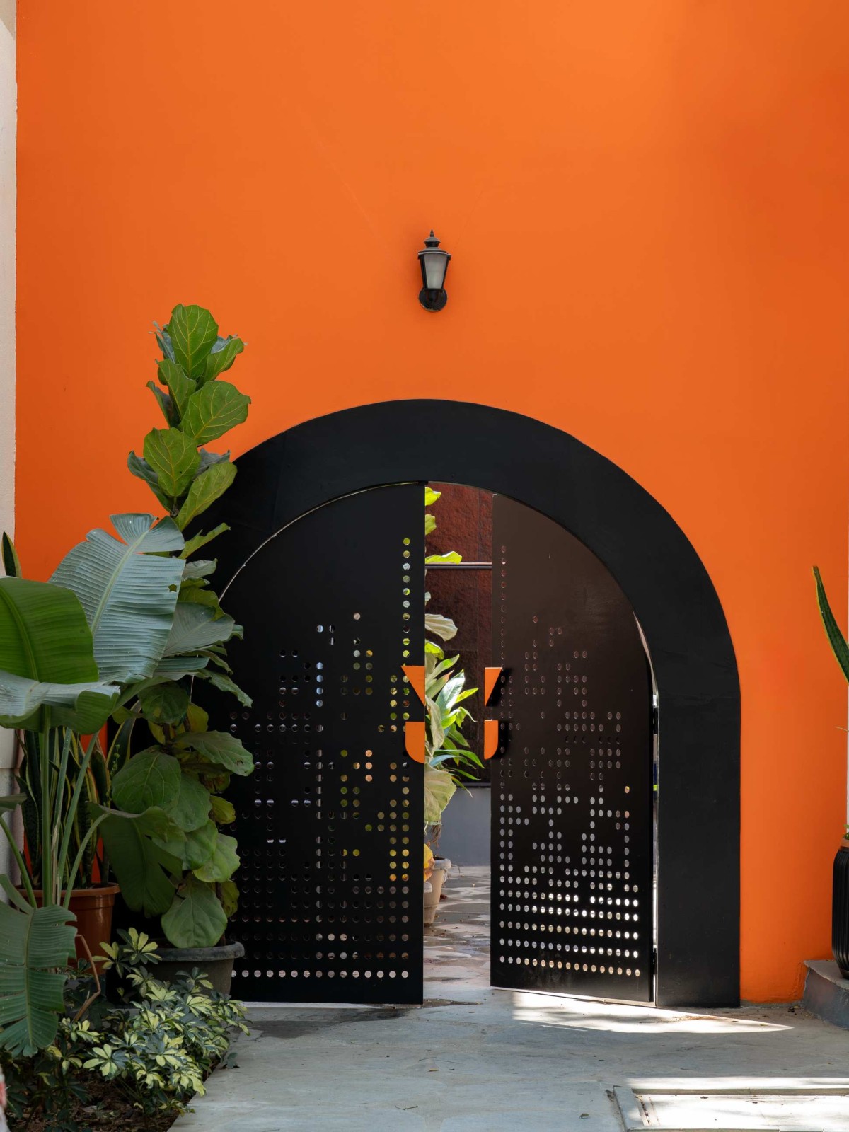 Outdoor entrance of Drip And Drop by Inari Atelier