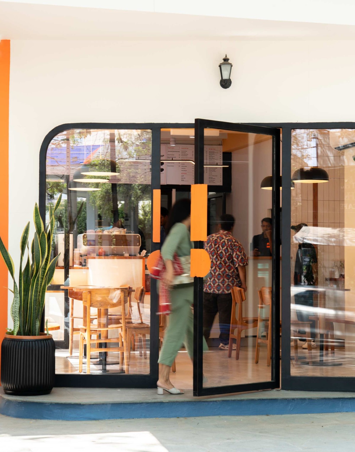 Entrance door of Drip And Drop by Inari Atelier