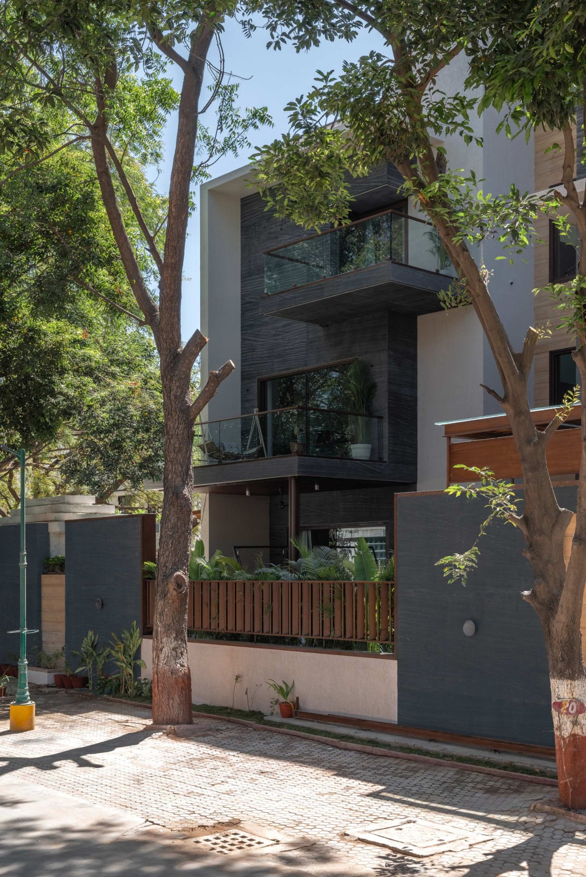 Exterior view of Green Serene House by Manoj Patel Design Studio
