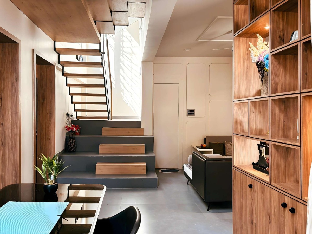 Dining to Staircase view of Saksham by DESiGN fEEDER Architects