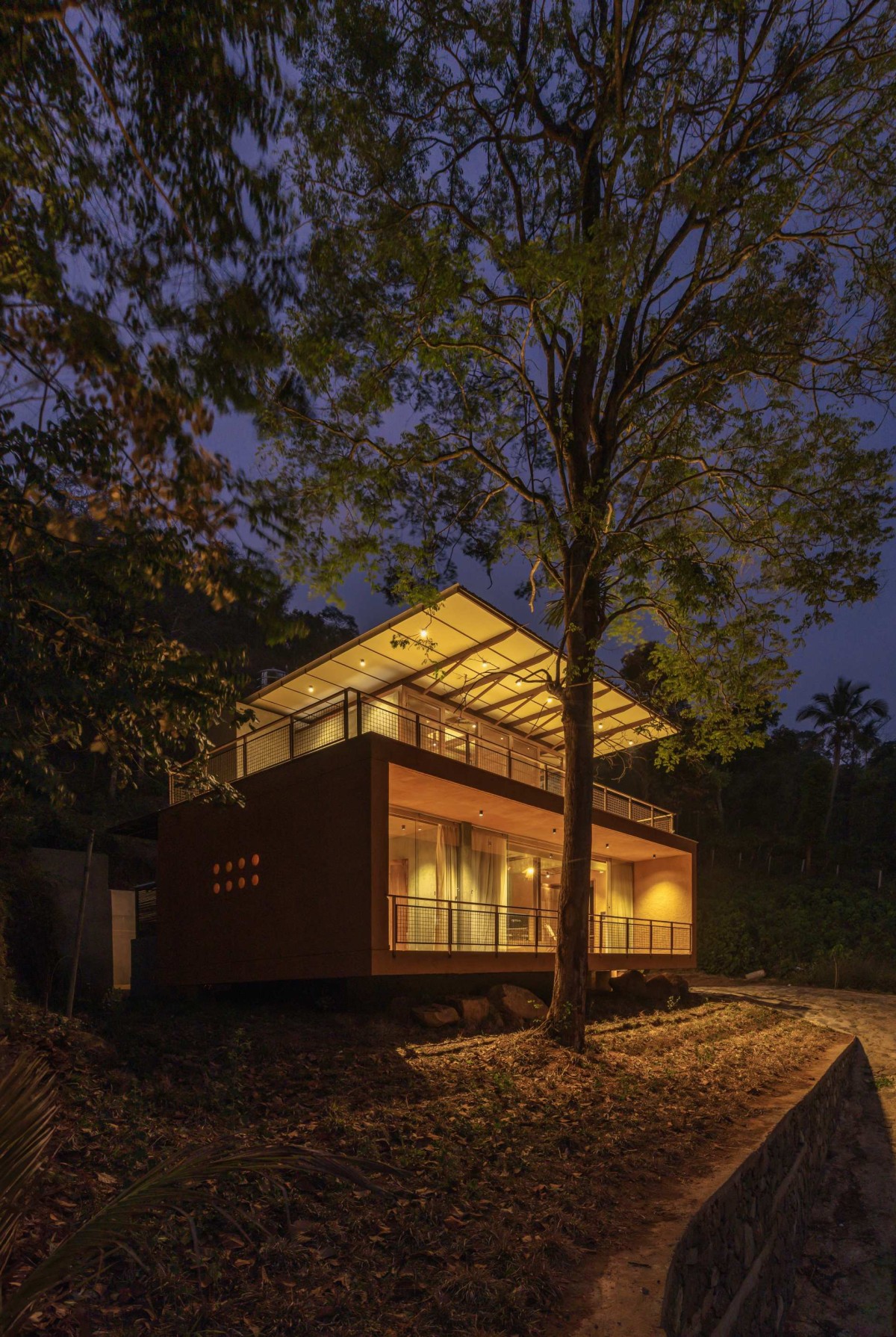 Dusk light exterior view of Urul by Studio Terratects