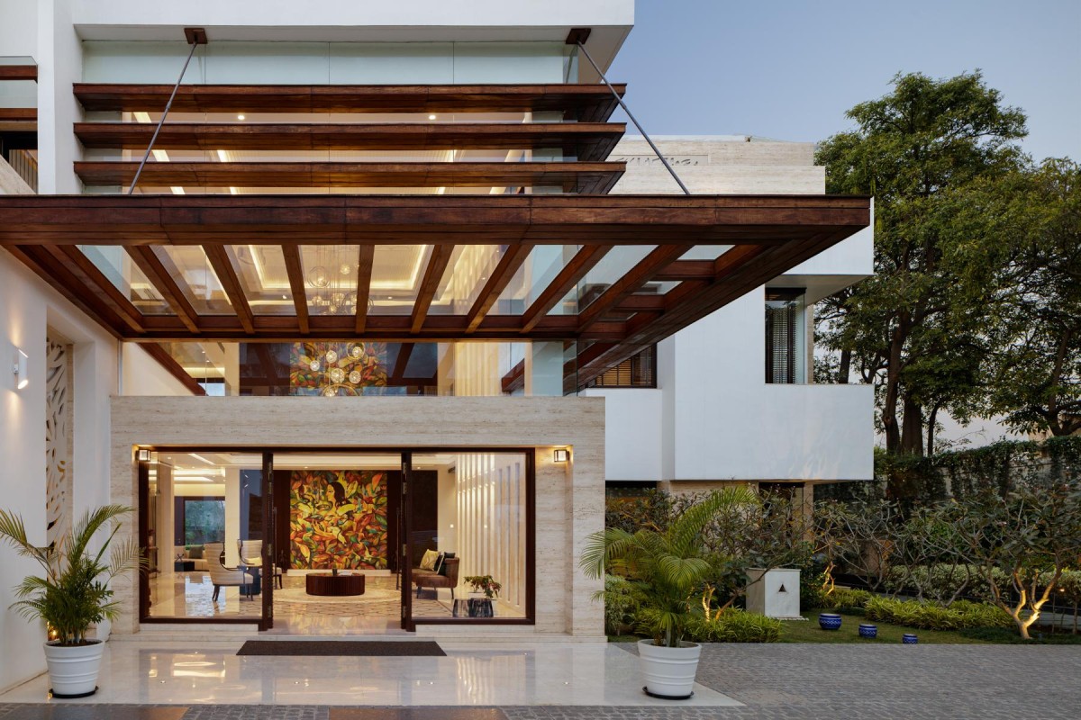 Entry to living room of The Pastel House by Creative Designer Architects