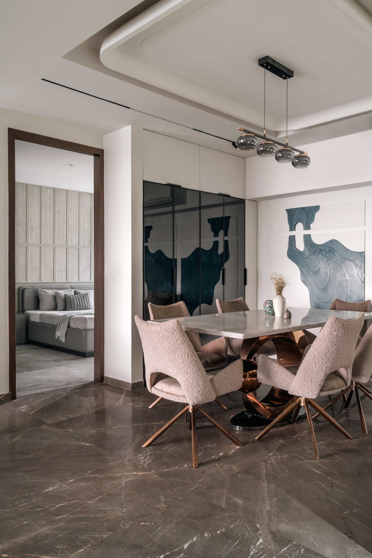 Dining of 4BHK Apartment at Akshar Iland By Scj Architects & Interior Designers
