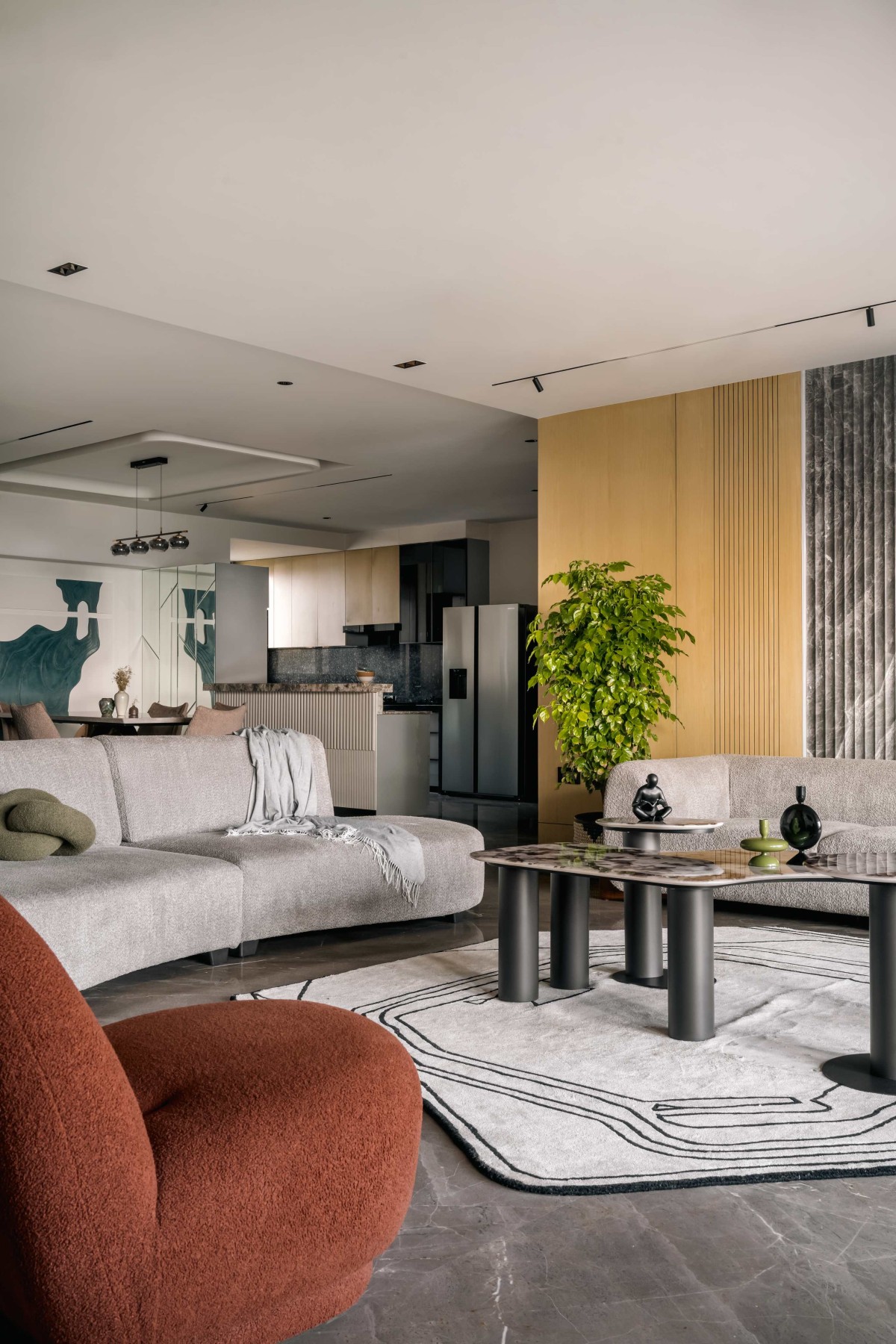 Living room of 4BHK Apartment at Akshar Iland By Scj Architects & Interior Designers