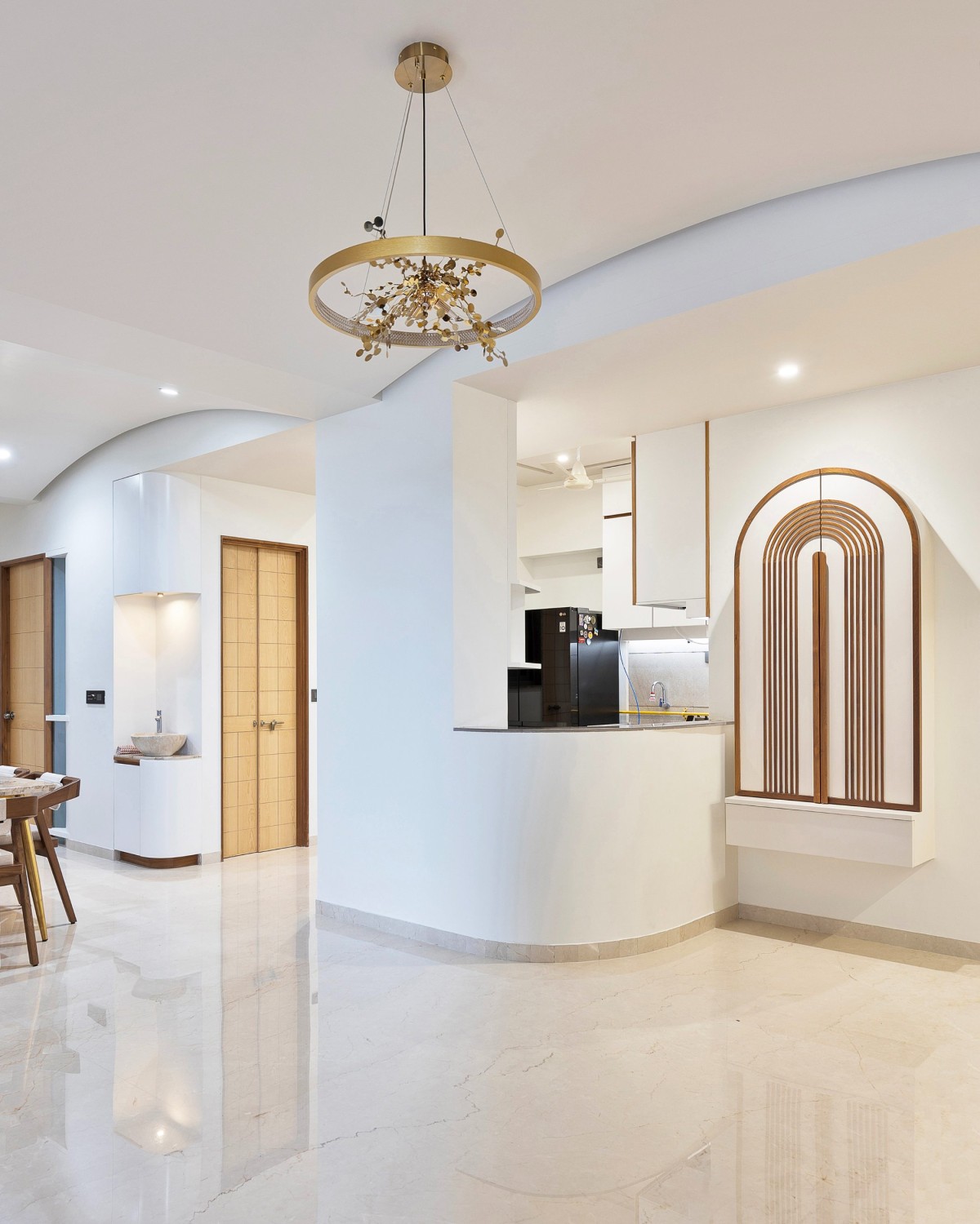 Pooja Mandir to Dining view of Apartment B-1304 by Studio 4000