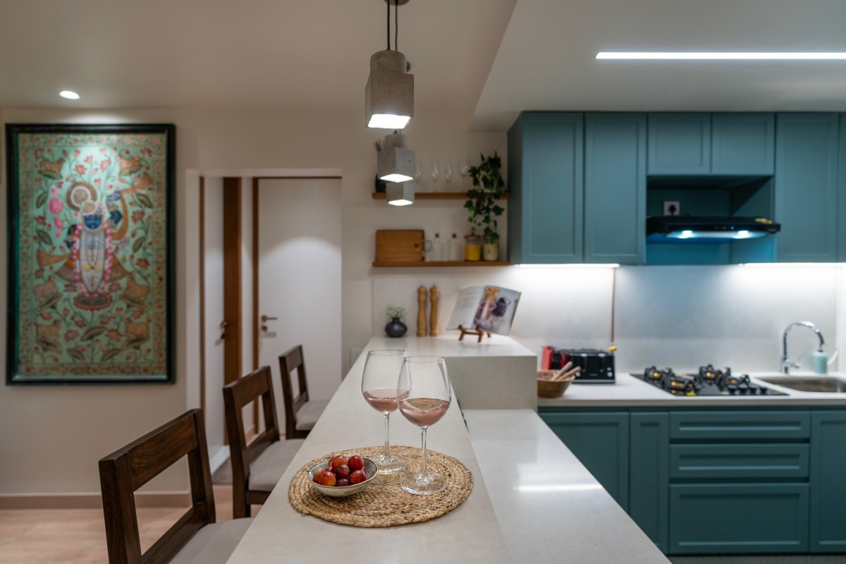 Bringing in nature green through the open kitchen cabinets of Maison Blanche by Oris Architects