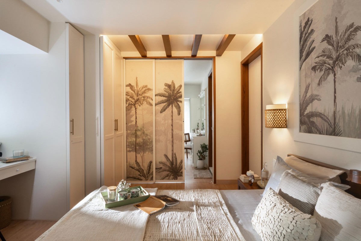 Custom mural flowing through the bed back wall & sliding door of Maison Blanche by Oris Architects