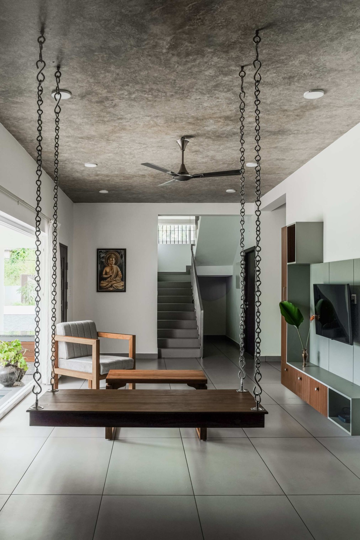 Living room of Kumaranelloor House by N&RD