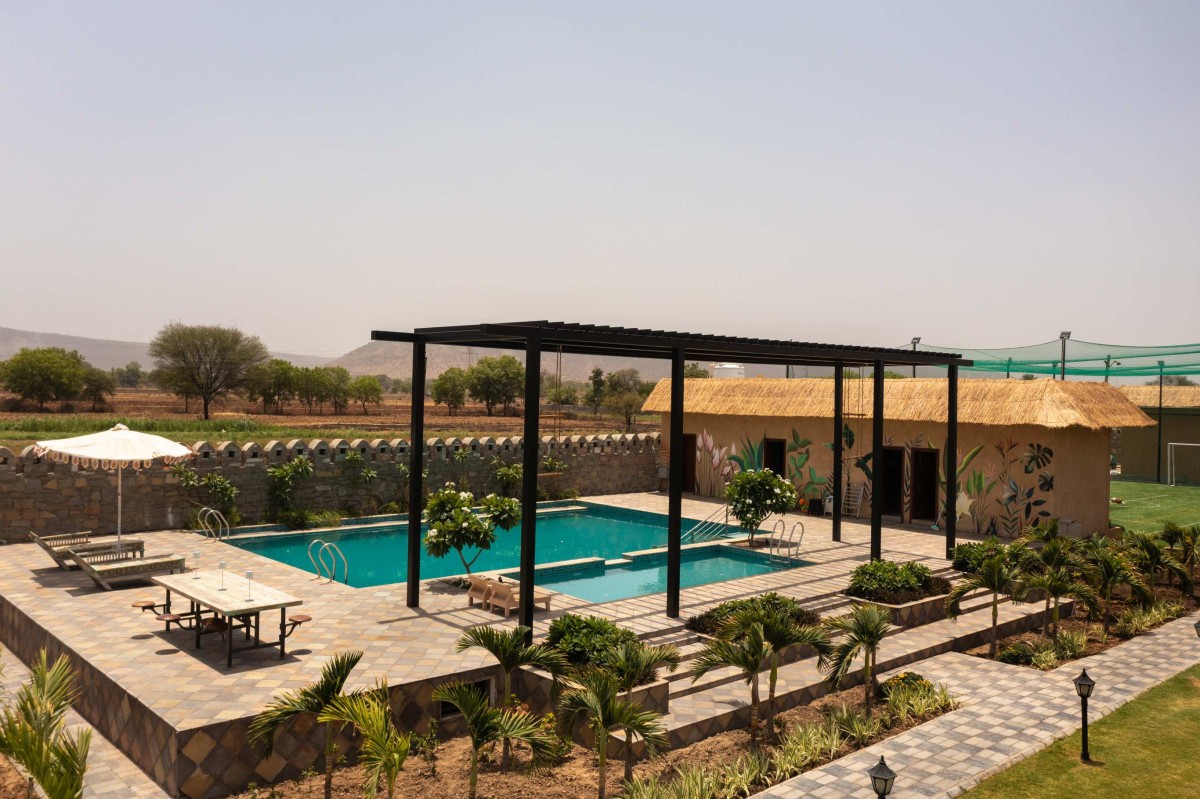 Pool area of Shivaray Farms by Studio Shunya
