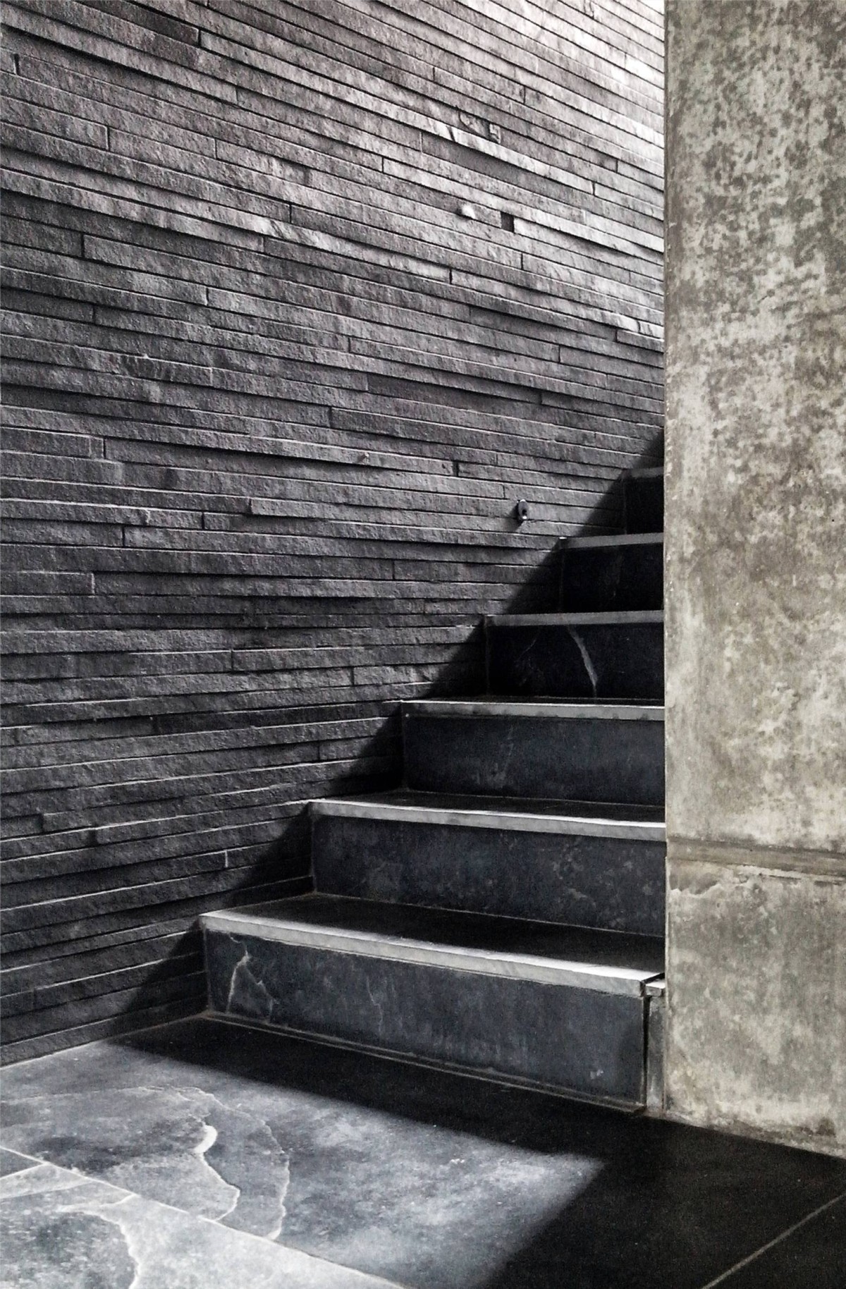 Staircase of The House Cast in Liquid Stone by SPASM Design Architects