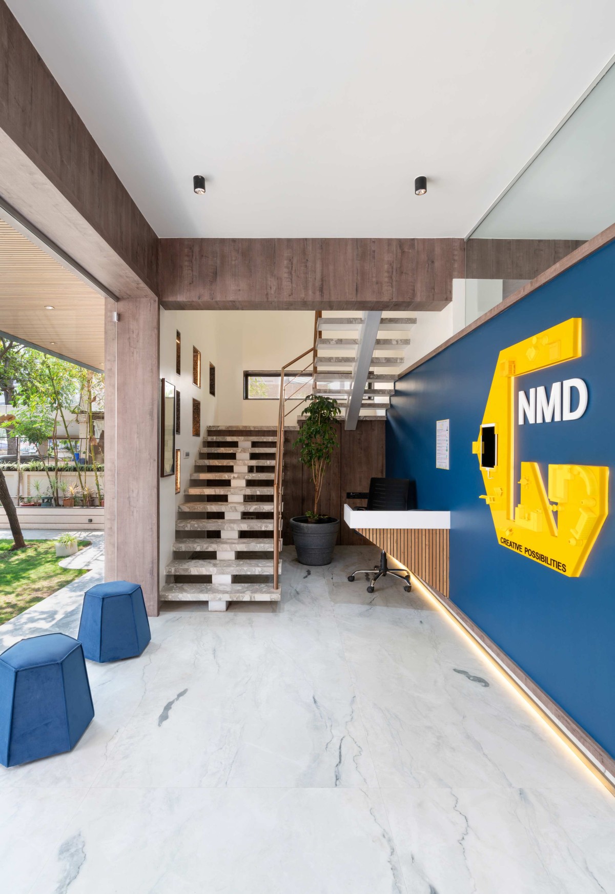 Passage to reception area of NMD Interiors Studio Design by NMD Interiors