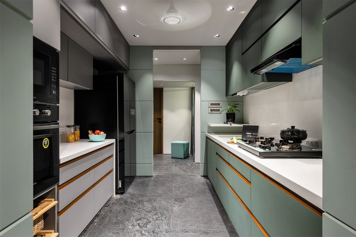Kitchen of Cladded House by Sanjay Newaskar Designs LLP
