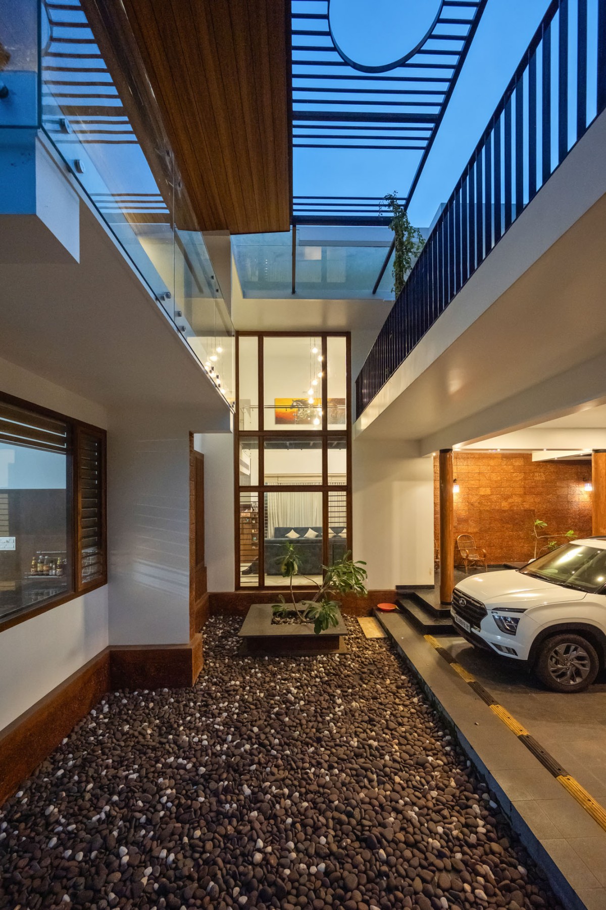 Parking area of The Frangipani House by Designature Architects