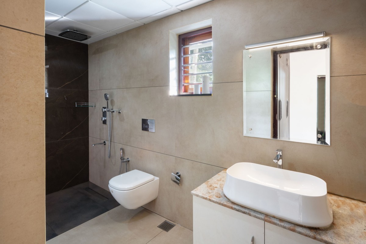 Bathroom of The Frangipani House by Designature Architects