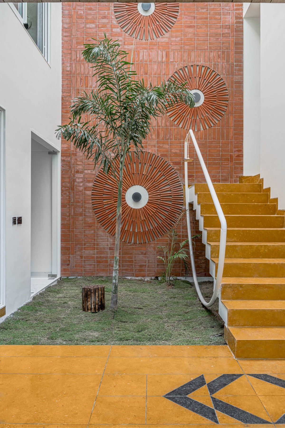 Triple Height Courtyard of The Courtyard House by Manoj Patel Design Studio