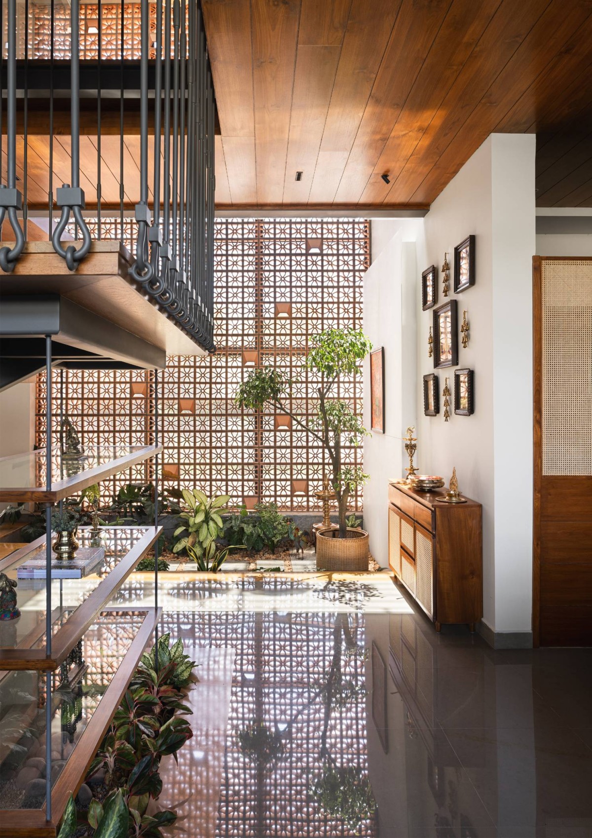 Internal Courtyard of Carving a COURT OF QUIETUDE in a Bustling Cityscape by Mudbricks Architects