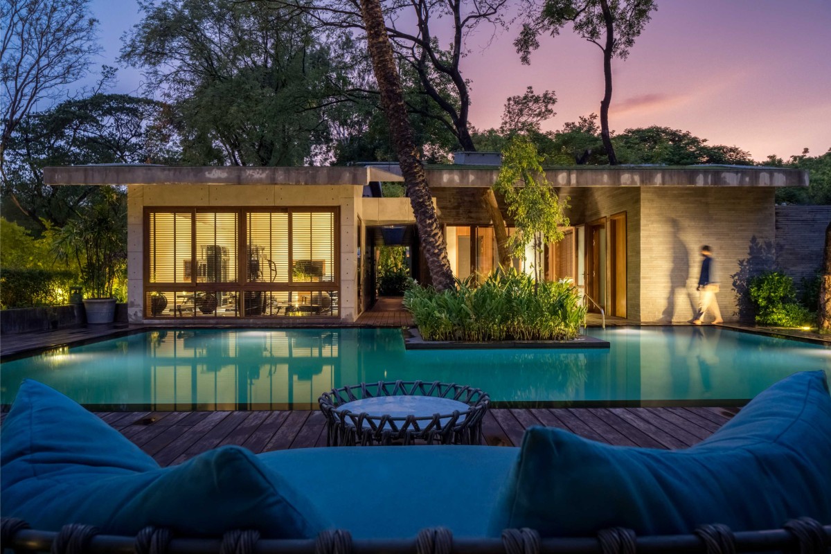 Night view of Clubhouse of Maheshwari House by Anil Ranka Architects